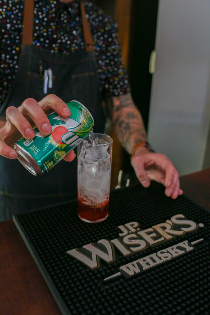 Bartender preparing cocktails at a private event at Hook & Ladder Manufacturing Company in Midtown Sacramento.