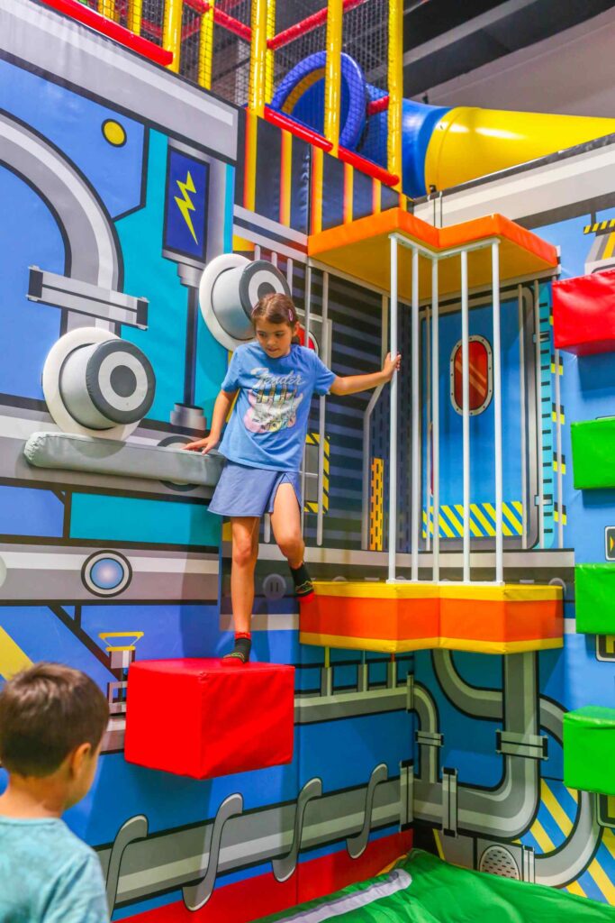 Kid climbing the Ninja Course at Peek-a-Boo Factory Rancho Cordova.